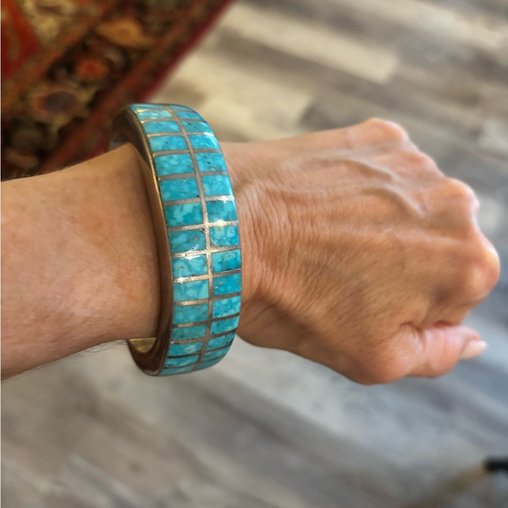 Sterling silver cuff bracelet with turquoise inset.